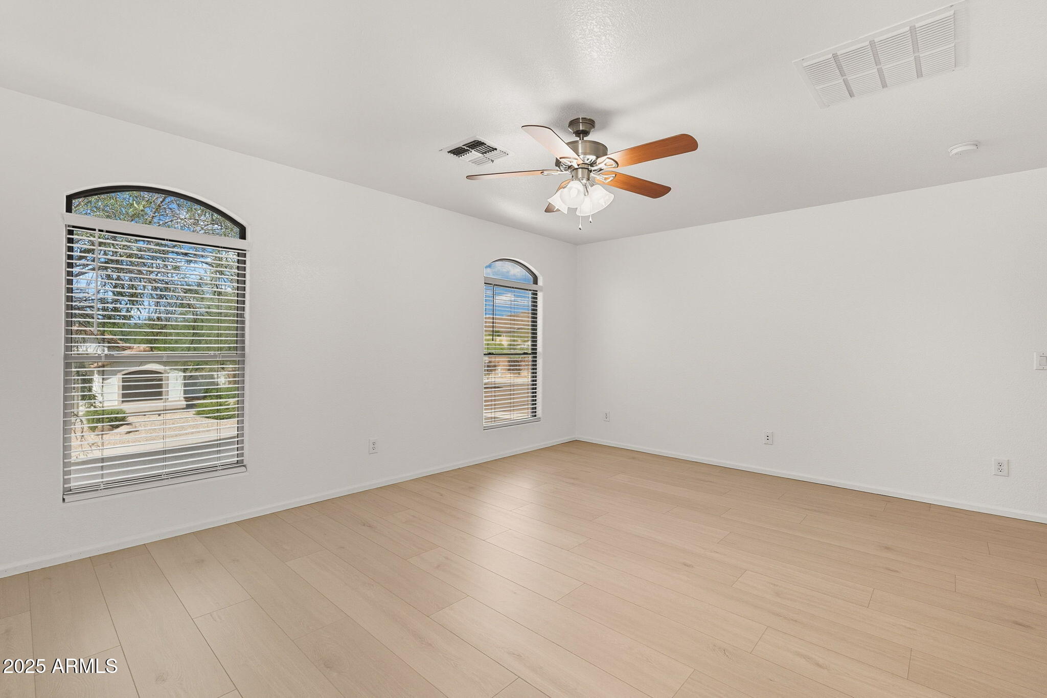 2503 West Gambit Trail Phoenix, AZ 85085 - Photo 33 of 54 a view of an empty room with a window