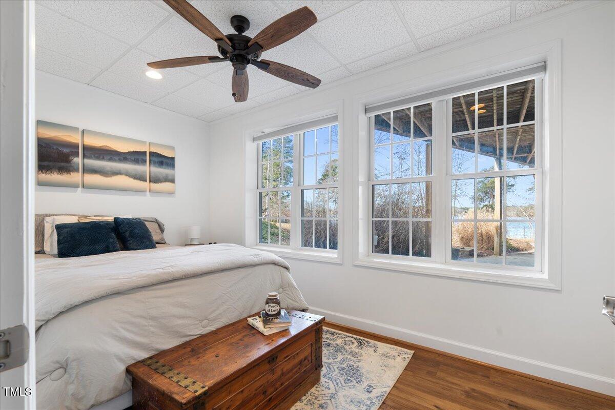 1171 Buck Street Road Roxboro, NC 27574 - Photo 35 of 63 a bedroom with furniture and window