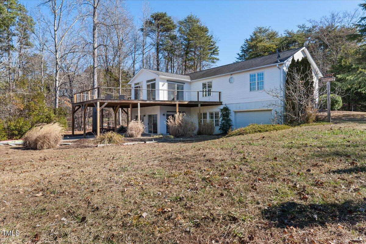 1171 Buck Street Road Roxboro, NC 27574 - Photo 38 of 63 a view of a house with a yard