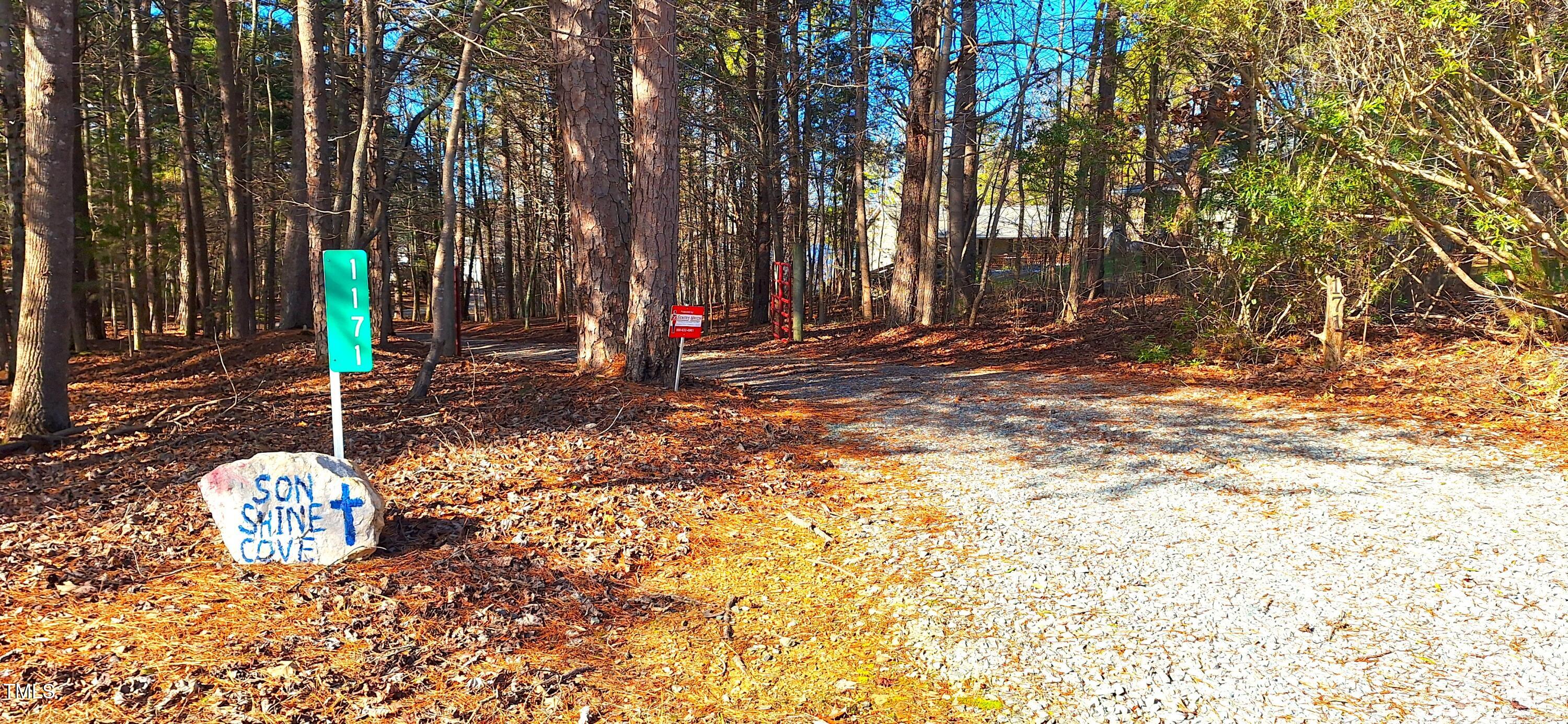 1171 Buck Street Road Roxboro, NC 27574 - Photo 43 of 63 a view of a outdoor space with trees