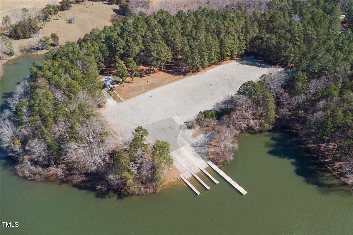 1171 Buck Street Road Roxboro, NC 27574 - Photo 53 of 63 an aerial view of ocean house swimming pool and trees