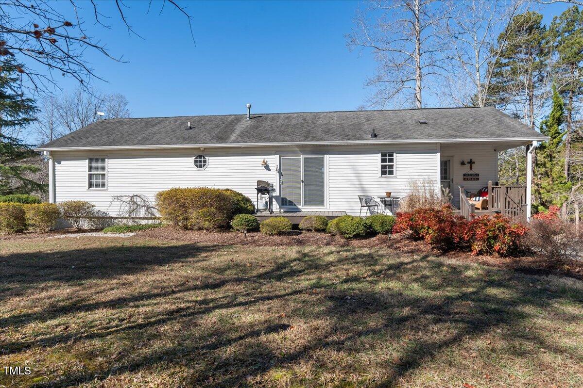 1171 Buck Street Road Roxboro, NC 27574 - Photo 7 of 63 a view of a house with a outdoor space