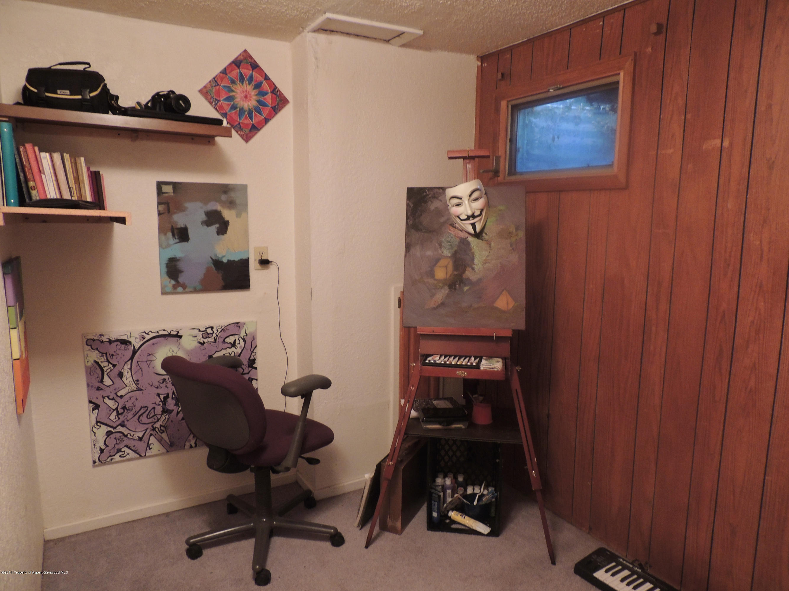 411-413 East 1st Street Rifle, CO 81650 - Photo 14 of 15 Lower small bedroom/office