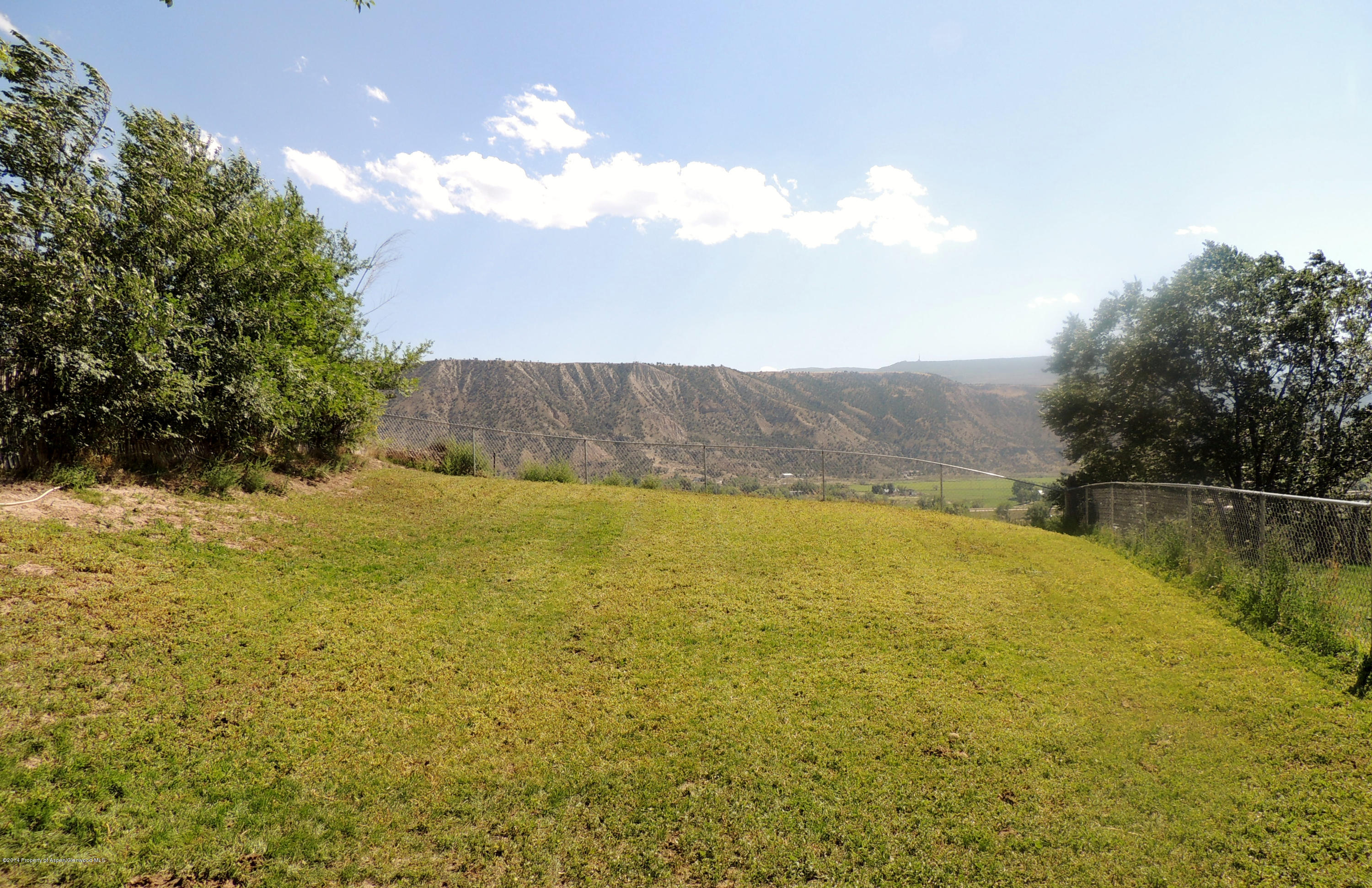 411-413 East 1st Street Rifle, CO 81650 - Photo 3 of 15 Large Fenced Yard & Views