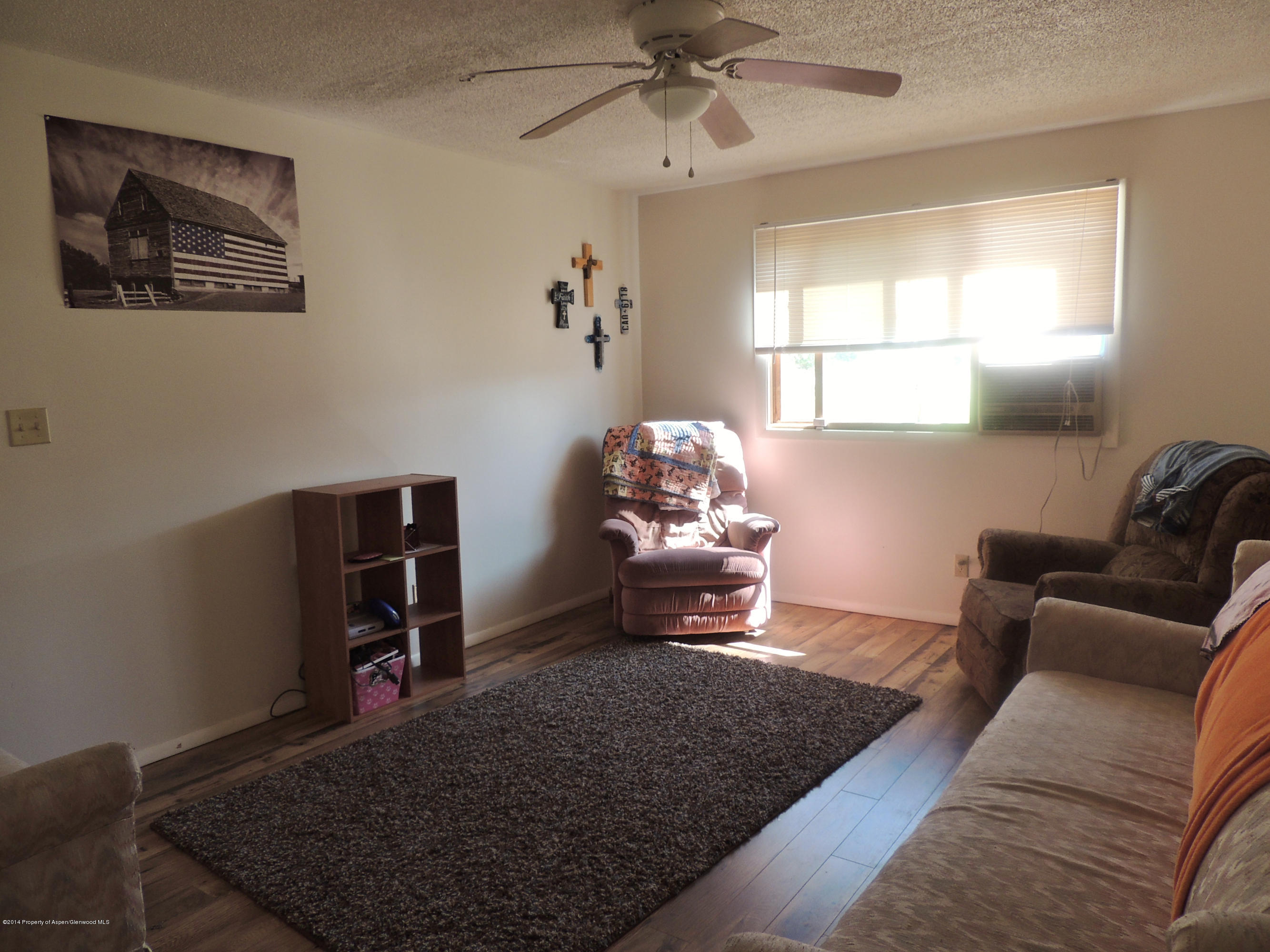 411-413 East 1st Street Rifle, CO 81650 - Photo 4 of 15 Upper Living Room