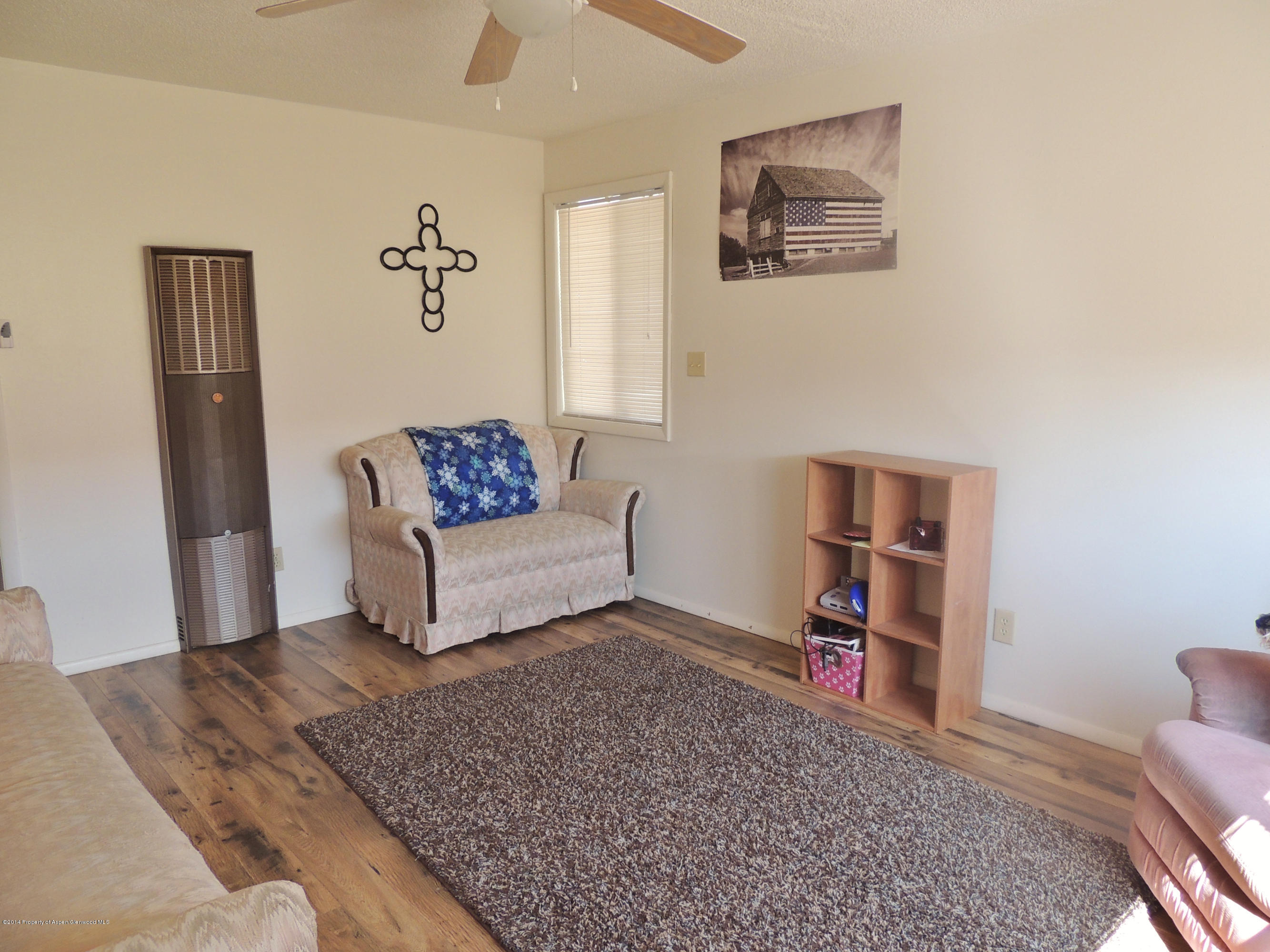 411-413 East 1st Street Rifle, CO 81650 - Photo 5 of 15 Upper Living Room