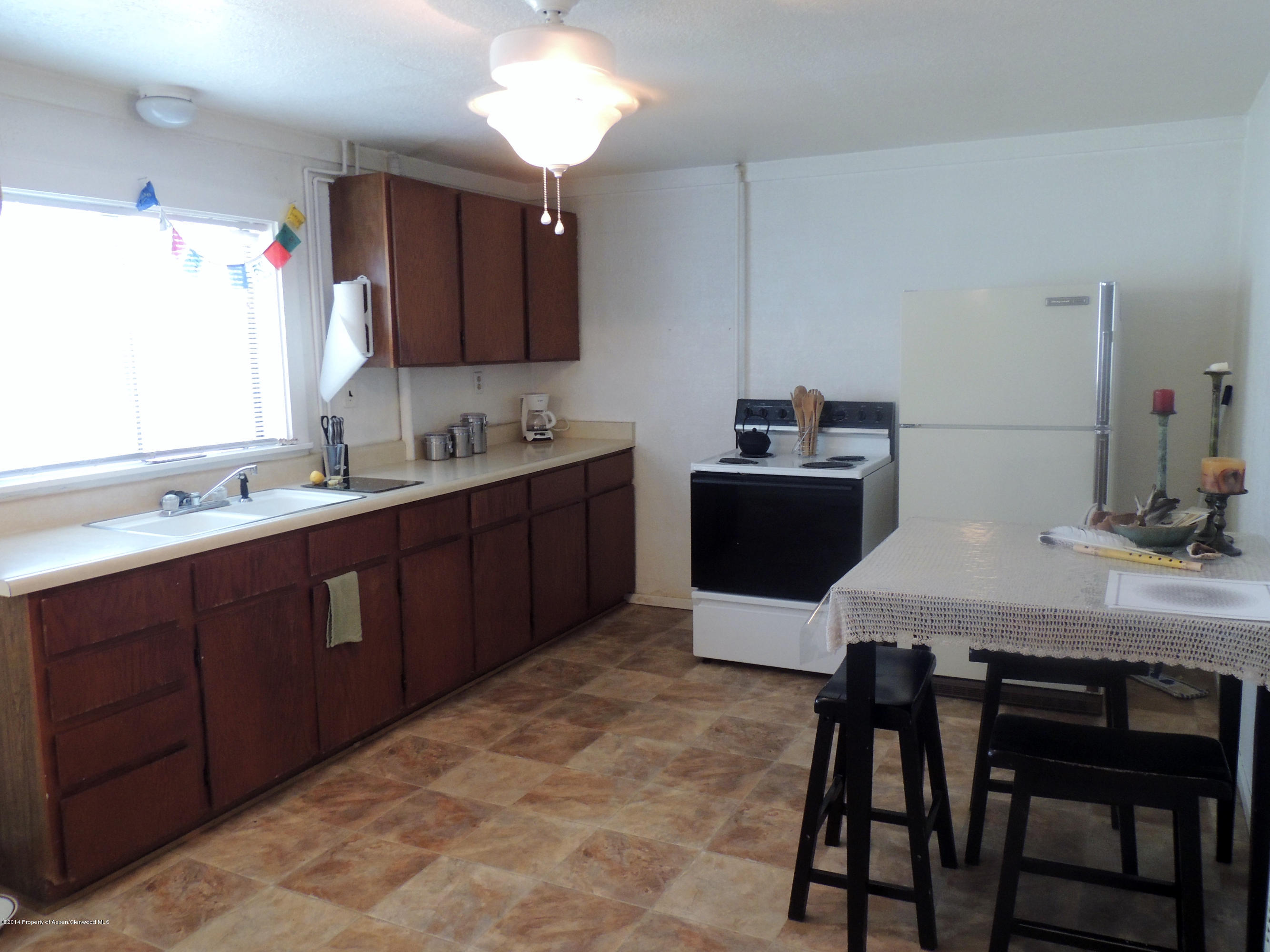 411-413 East 1st Street Rifle, CO 81650 - Photo 9 of 15 Lower Kitchen