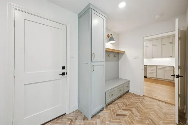 a kitchen with cabinets and window