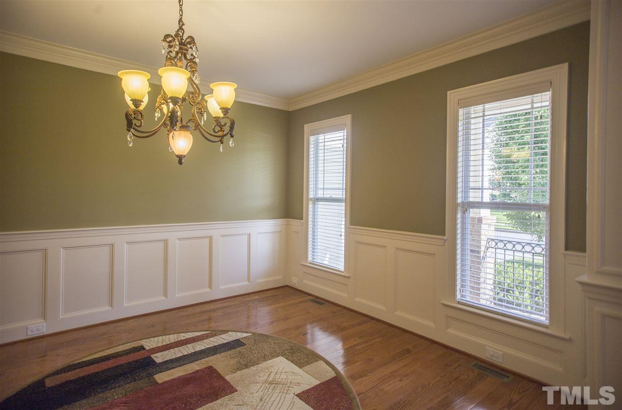 307 Ashdown Forest Lane Cary, NC 27519 - Photo 4 of 25 a view of an empty room with a window