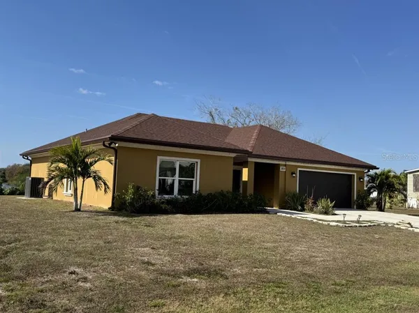 a front view of house with yard