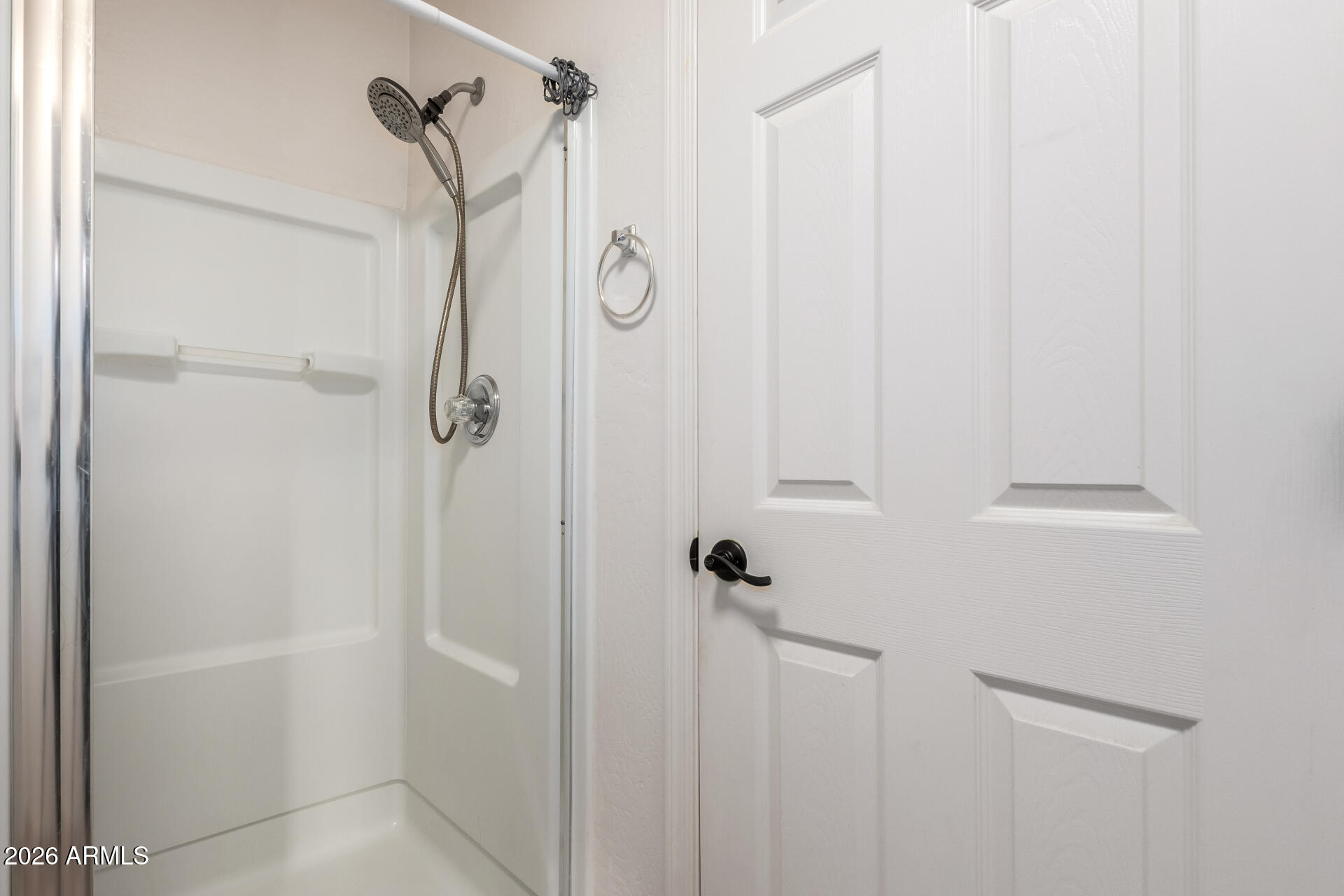 1491 East Rolls Road San Tan Valley, AZ 85143 - Photo 19 of 35 a bathroom with a shower