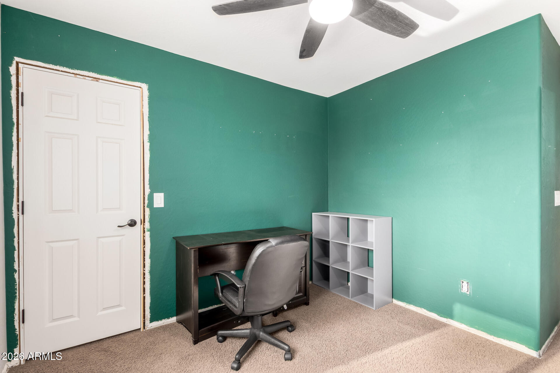 1491 East Rolls Road San Tan Valley, AZ 85143 - Photo 25 of 35 a view of a workspace with furniture and a window