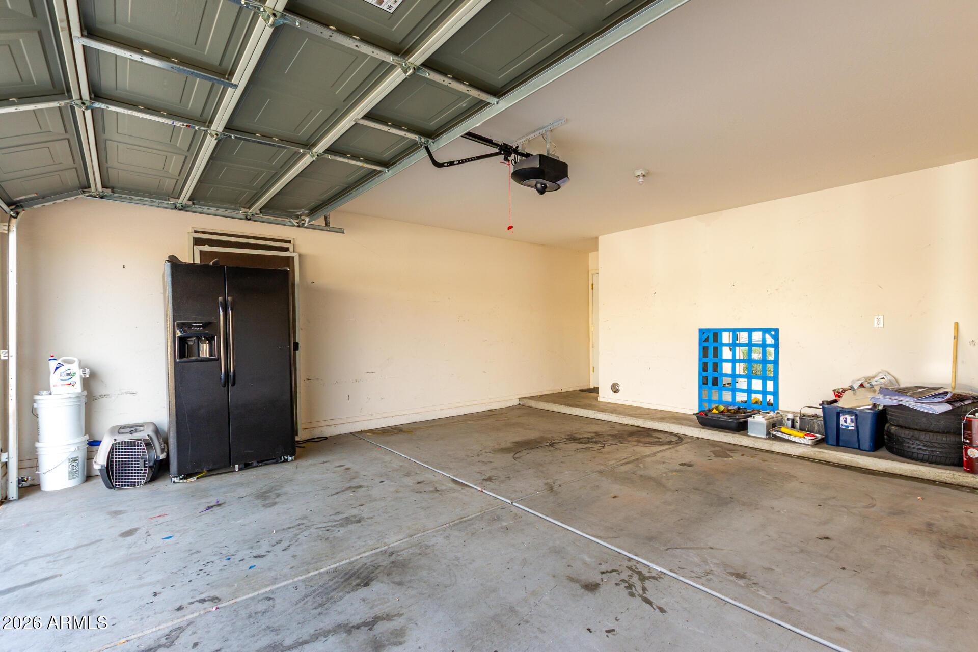 1491 East Rolls Road San Tan Valley, AZ 85143 - Photo 30 of 35 a view of a car garage