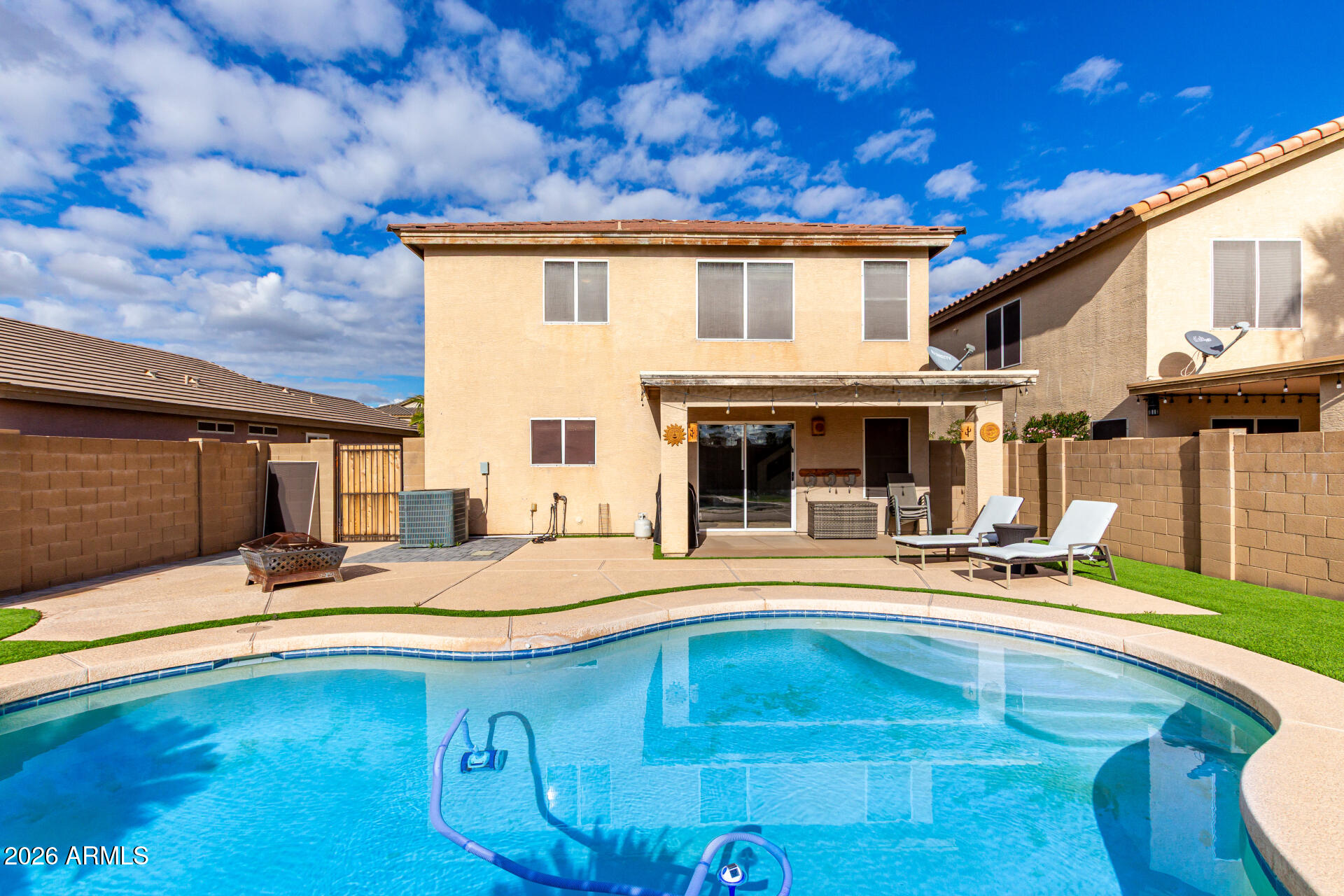 1491 East Rolls Road San Tan Valley, AZ 85143 - Photo 33 of 35 a view of a house with swimming pool and sitting area