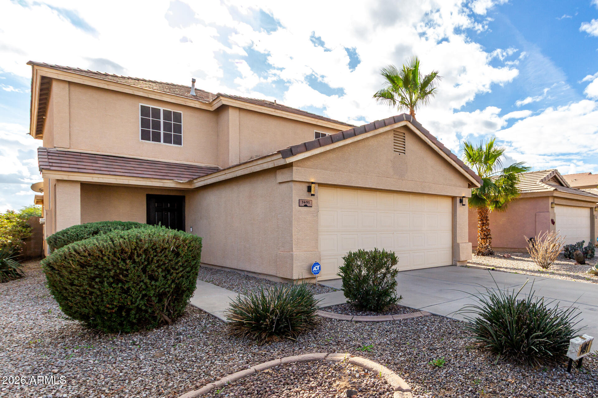 1491 East Rolls Road San Tan Valley, AZ 85143 - Photo 4 of 35 a view of a house with a patio