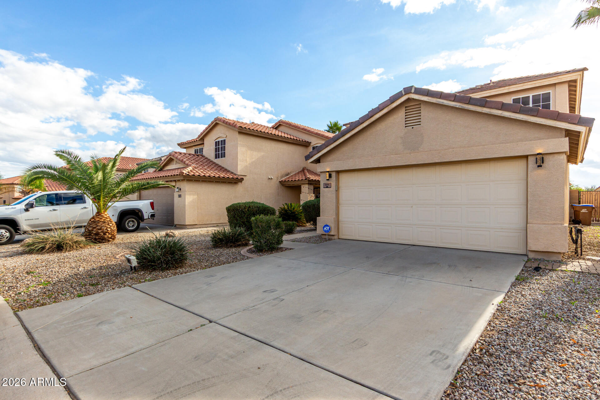 1491 East Rolls Road San Tan Valley, AZ 85143 - Photo 5 of 35 a view of a house with a patio