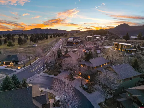 a view of front door of house with yard