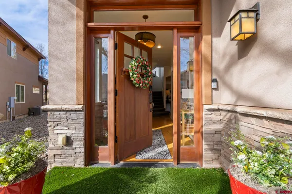 a bathroom with a toilet a sink and a mirror