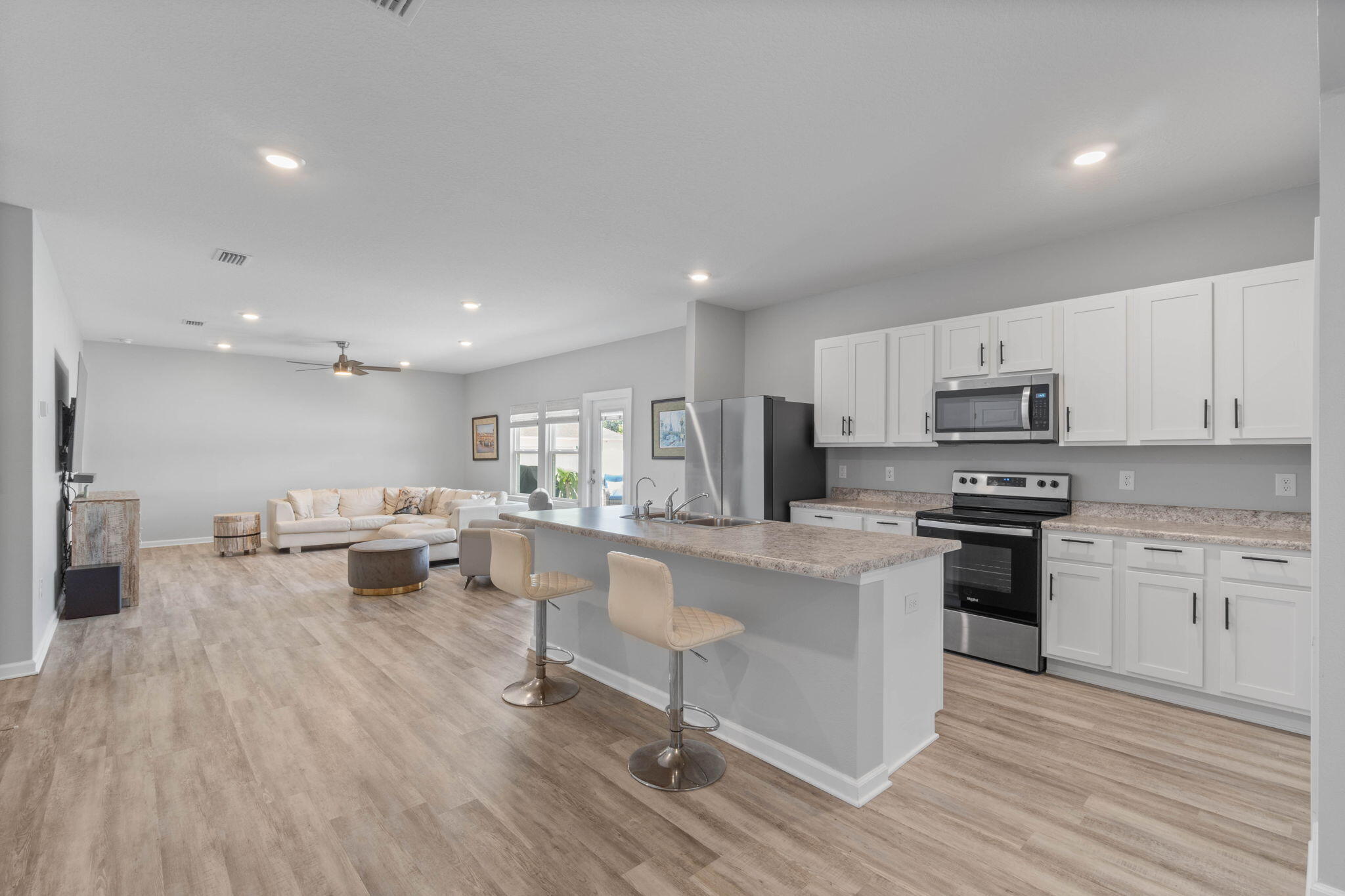 38 Silverthorn Street Freeport, FL 32439 - Photo 10 of 42 a large kitchen with stainless steel appliances