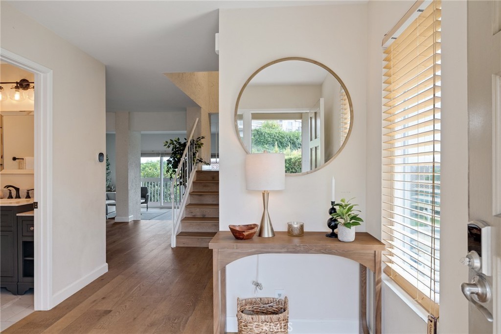 58 Hilltop Circle Rancho Palos Verdes, CA 90275 - Photo 13 of 51 a living room with furniture and a potted plant