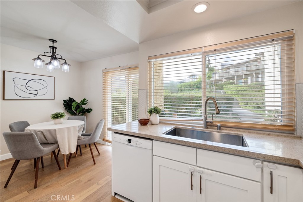 58 Hilltop Circle Rancho Palos Verdes, CA 90275 - Photo 19 of 51 a view of a dining room with furniture window and outside view