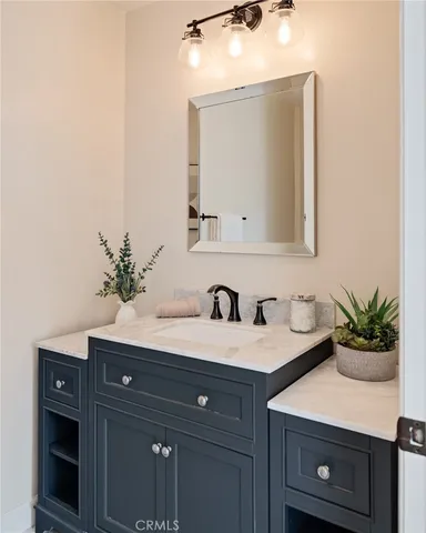 a view of a bathroom with a tub and shower