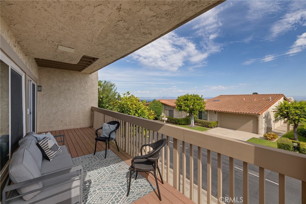 58 Hilltop Circle Rancho Palos Verdes, CA 90275 - Photo 27 of 51 a balcony view with a seating space