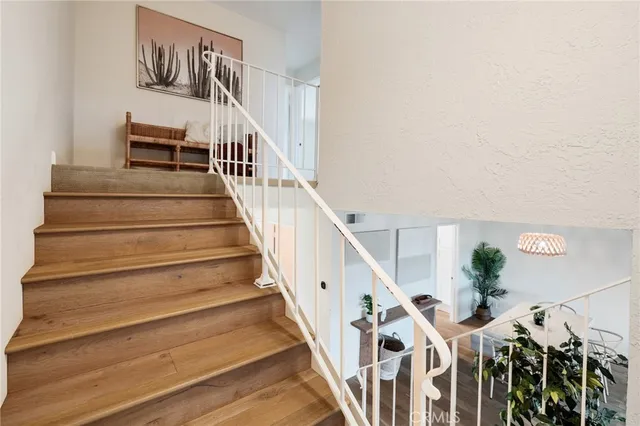 a view of an empty room with a fireplace