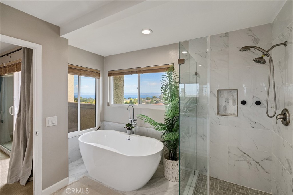 58 Hilltop Circle Rancho Palos Verdes, CA 90275 - Photo 37 of 51 a spacious bathroom with a bathtub and shower