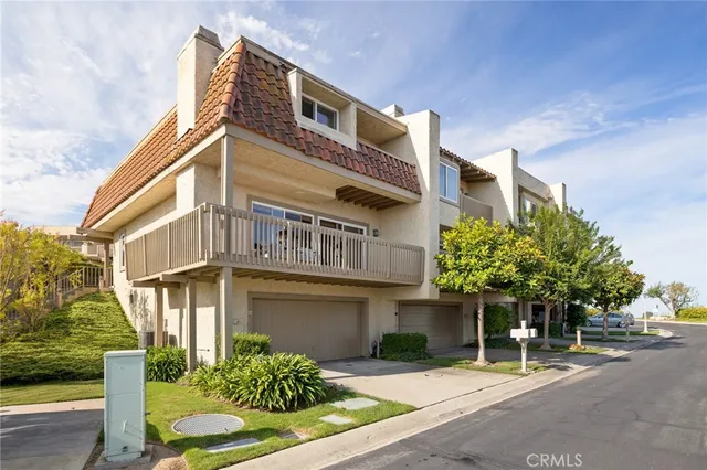 an aerial view of a city with lots of residential buildings