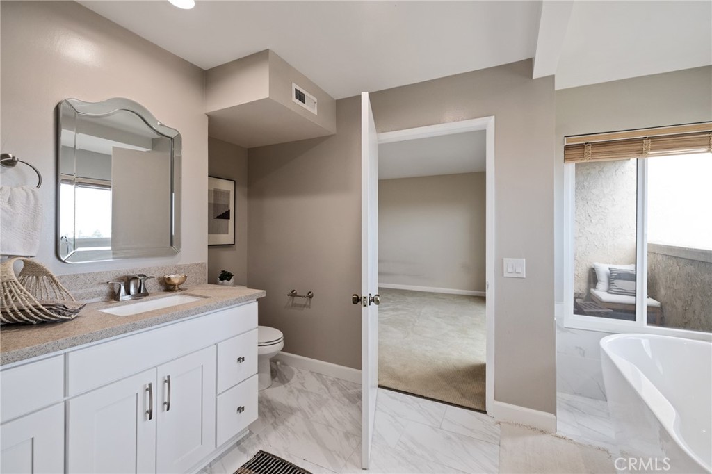 58 Hilltop Circle Rancho Palos Verdes, CA 90275 - Photo 41 of 51 a spacious bathroom with a double vanity sink mirror and double