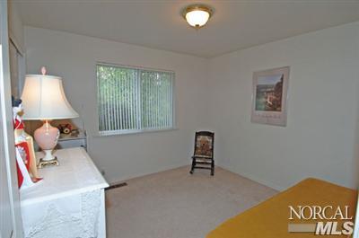 2152 Waltzer Road Santa Rosa, CA 95403 - Photo 7 of 9 a living room with furniture and a window