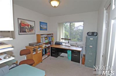 2152 Waltzer Road Santa Rosa, CA 95403 - Photo 8 of 9 a view of a workspace with furniture and a window