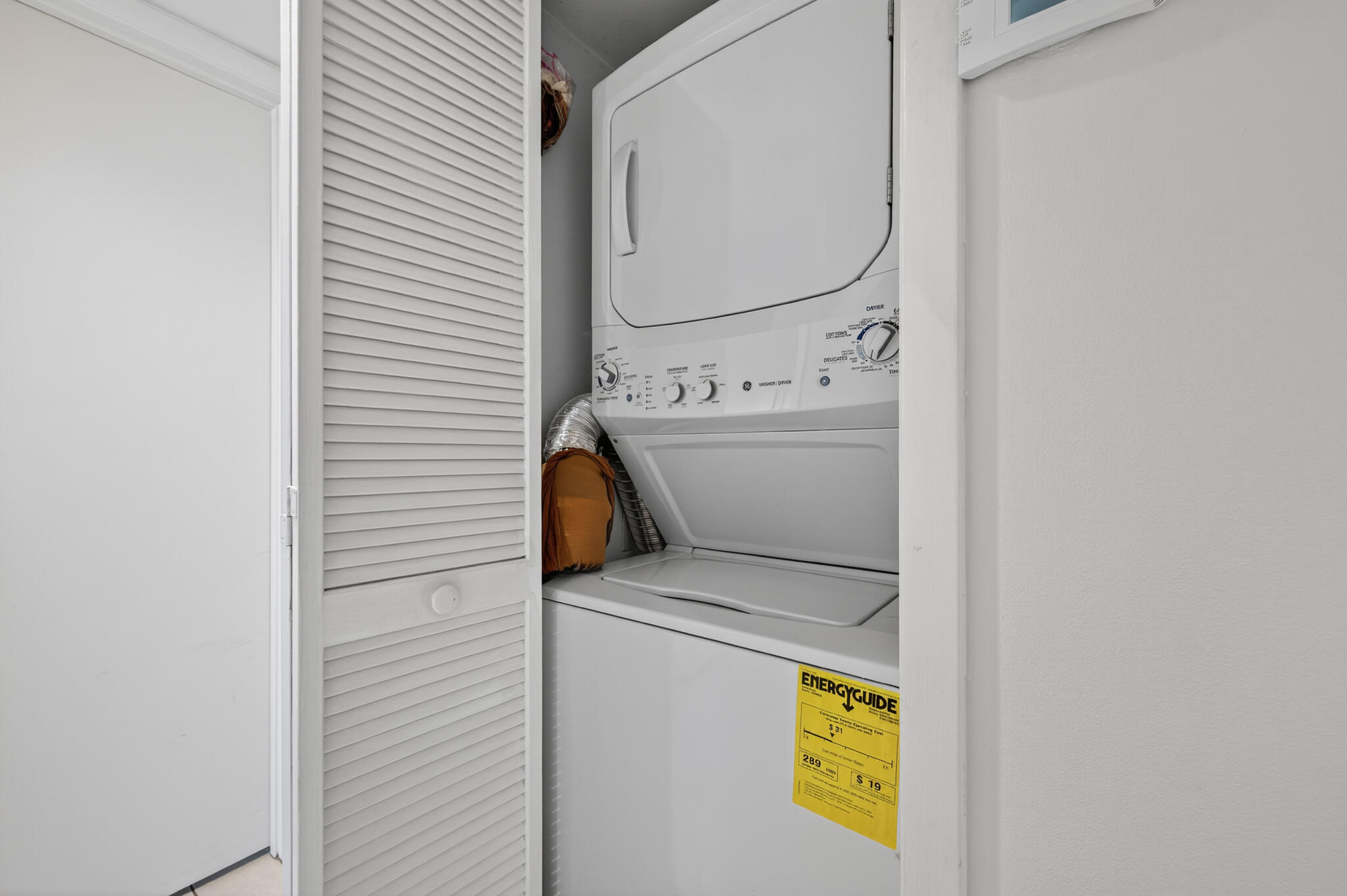 801 South Ocean Drive, Unit 404 Fort Pierce, FL 34949 - Photo 29 of 37 a utility room with dryer and washer