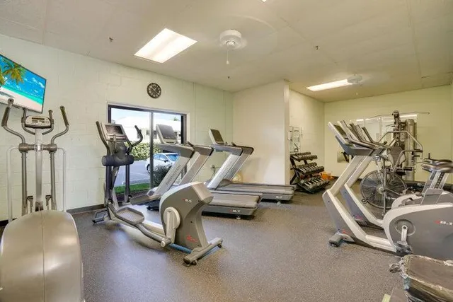 a view of a room with gym equipment