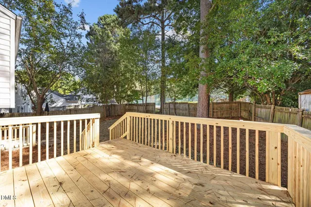 a view of a wooden fence