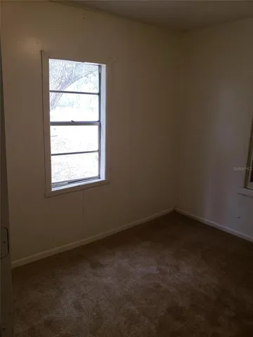 an empty room with a window