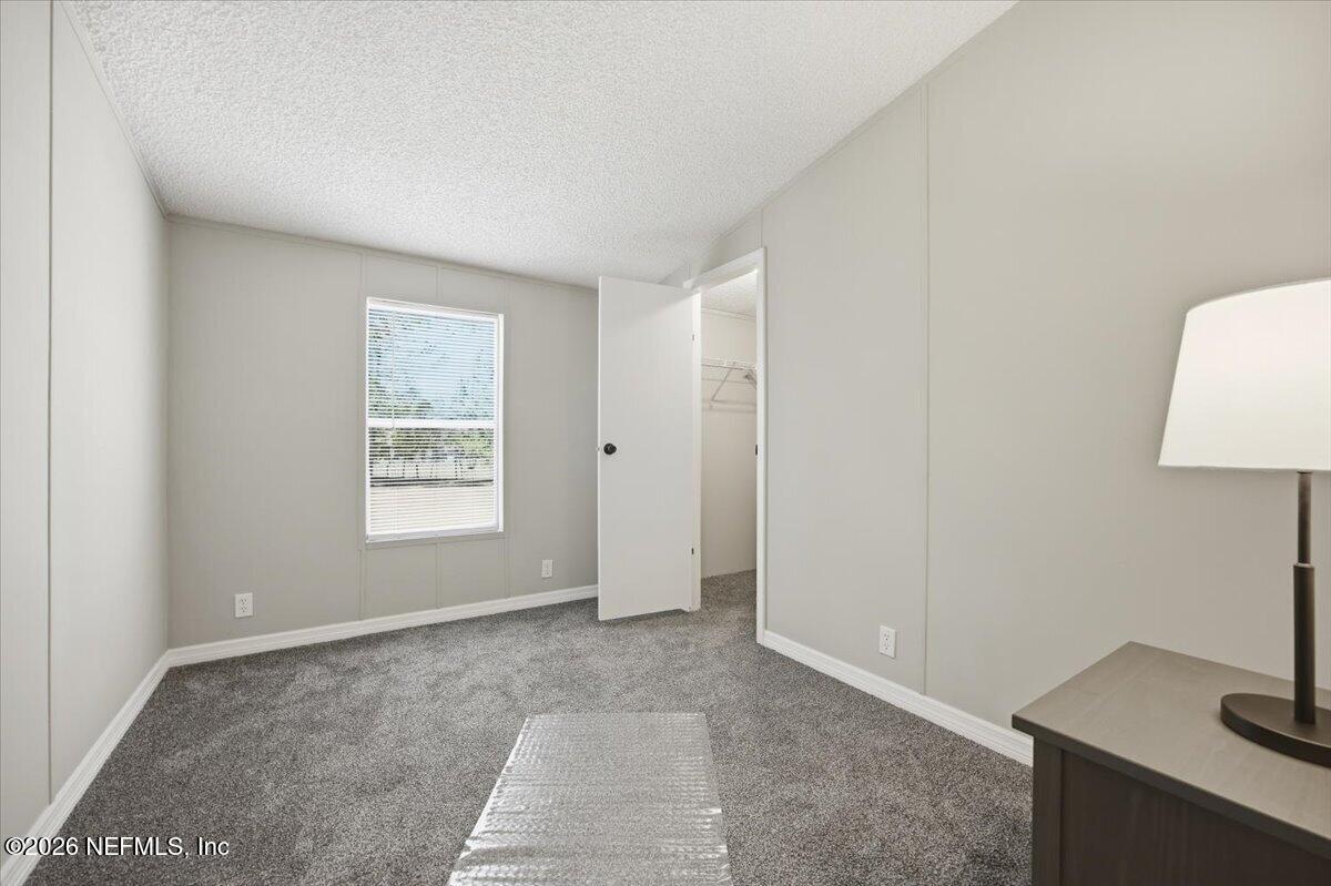 5621 Willow Road Macclenny, FL 32063 - Photo 11 of 15 a view of an empty room and window