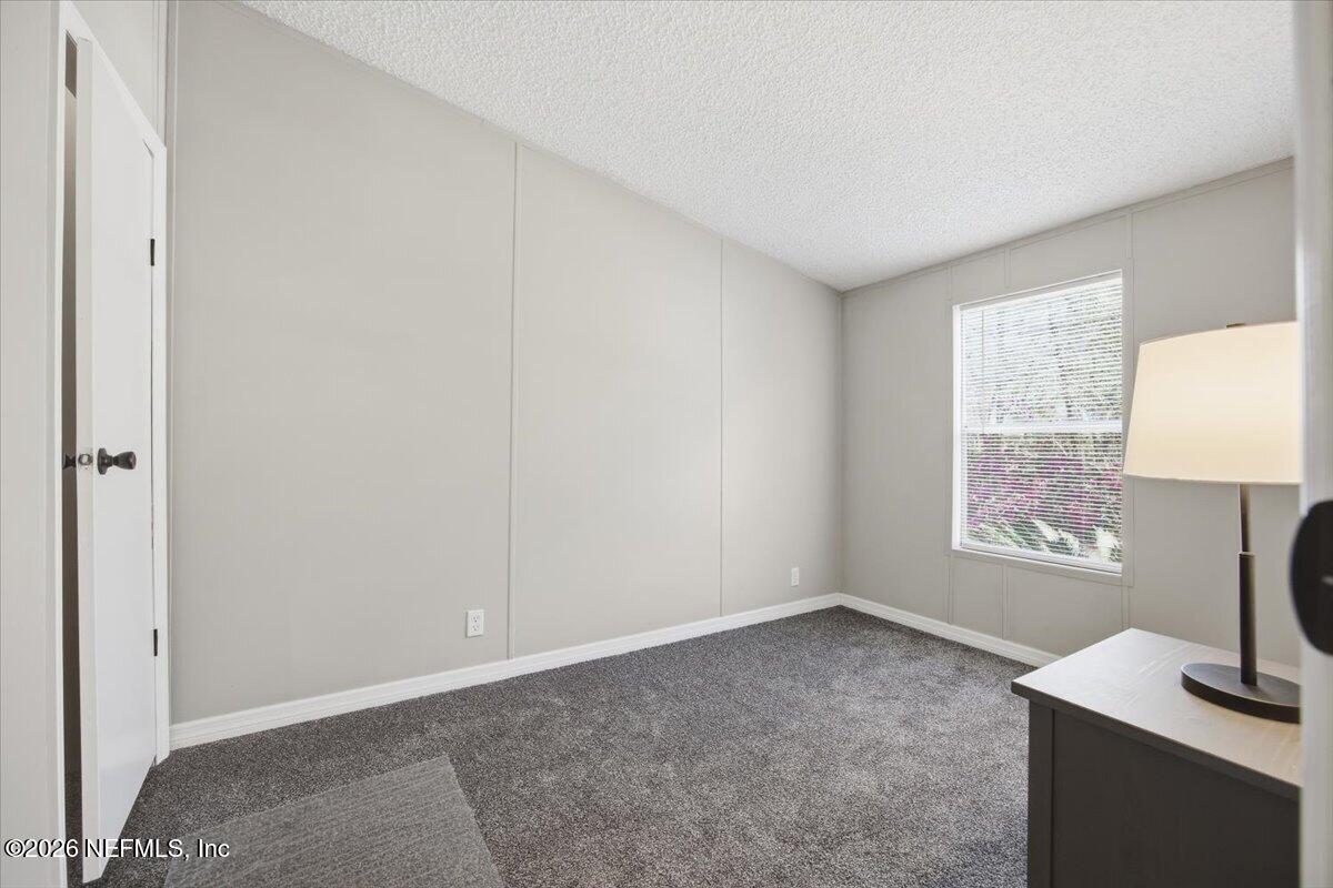 5621 Willow Road Macclenny, FL 32063 - Photo 13 of 15 a view of room with window and workspace