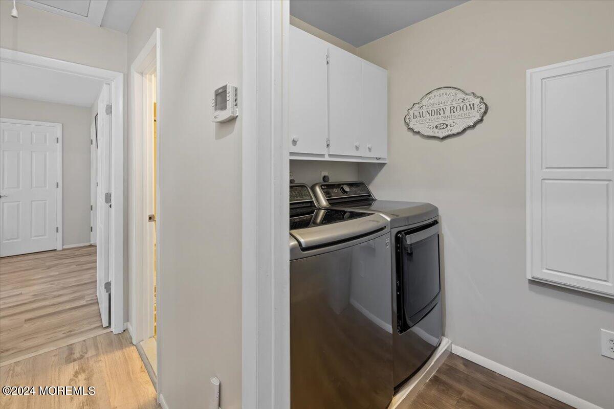 58 Overlook Drive Clinton, NJ 08809 - Photo 13 of 24 a view of storage and utility room with racks on the wall