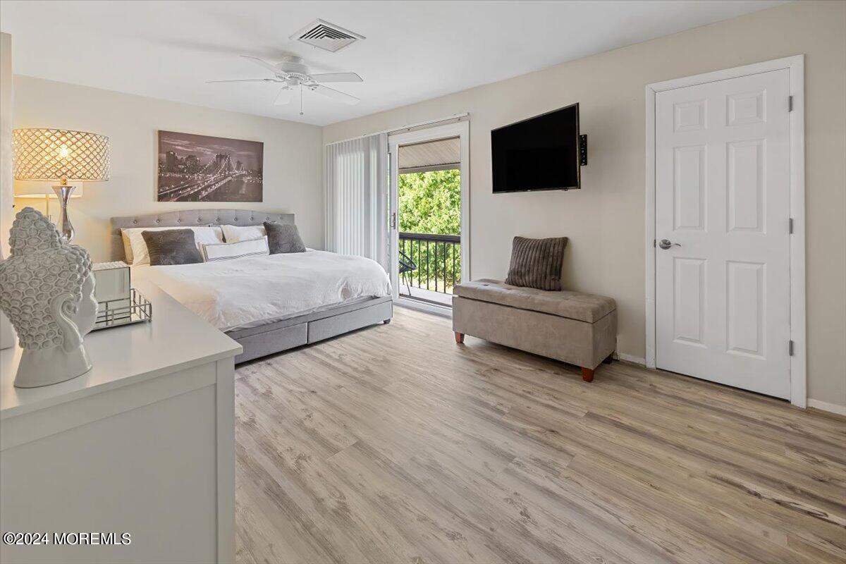 58 Overlook Drive Clinton, NJ 08809 - Photo 14 of 24 a living room with furniture and a flat screen tv