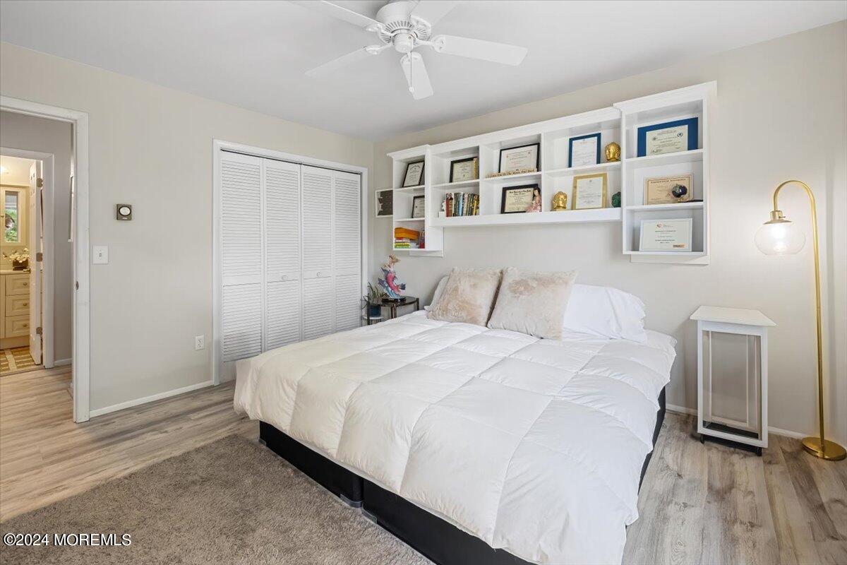 58 Overlook Drive Clinton, NJ 08809 - Photo 19 of 24 a bedroom with a bed and a window