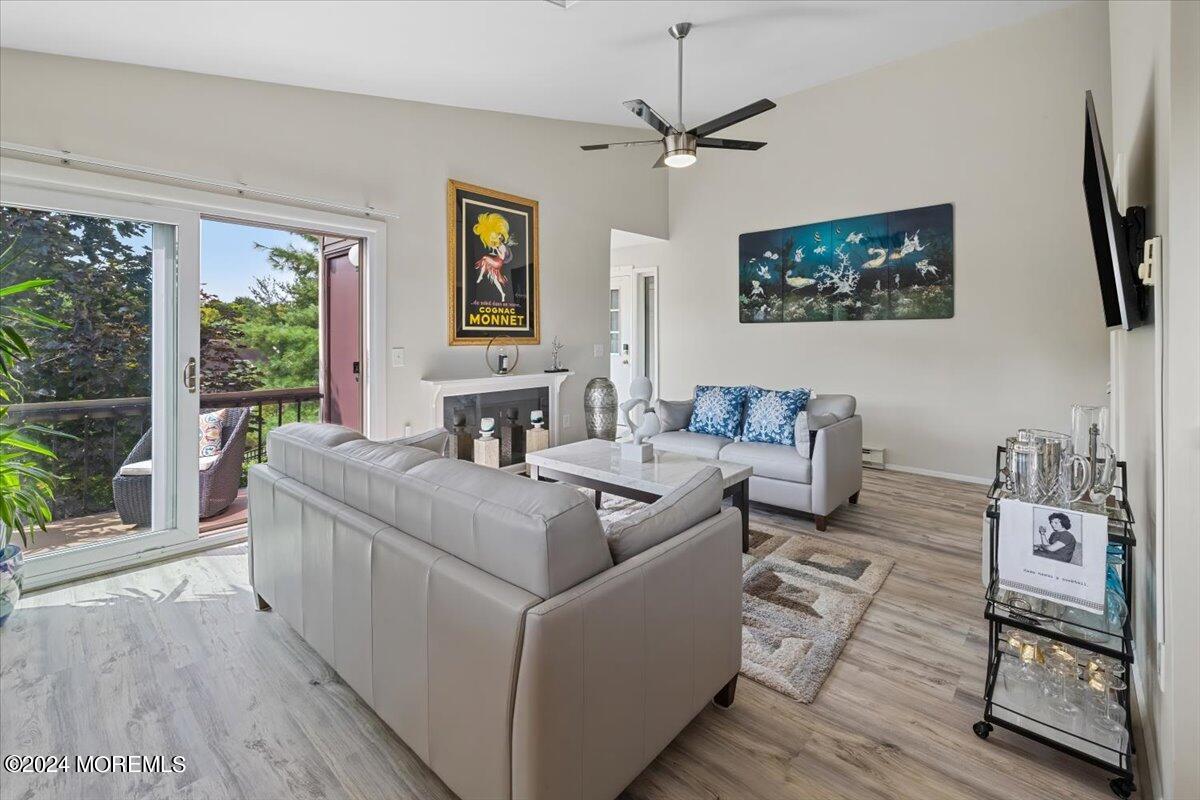 58 Overlook Drive Clinton, NJ 08809 - Photo 6 of 24 a living room with furniture and a flat screen tv