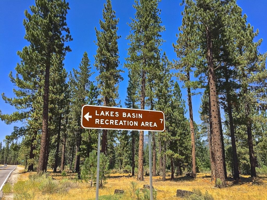 670 Redtail Loop Road Clio, CA 96106 - Photo 28 of 29 a street sign on a pole on a street