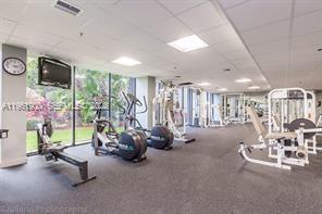 540 Brickell Key Drive, Unit 302 Miami, FL 33131 - Photo 16 of 24 a view of a room with gym equipment