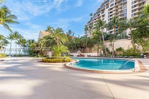 540 Brickell Key Drive, Unit 302 Miami, FL 33131 - Photo 19 of 24 a view of a playground with basketball court