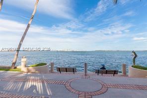 540 Brickell Key Drive, Unit 302 Miami, FL 33131 - Photo 21 of 24 a terrace with outdoor seating