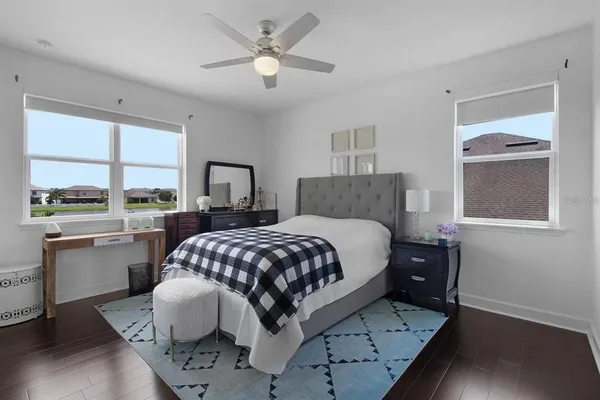 a view of a patio with swimming pool table and chairs