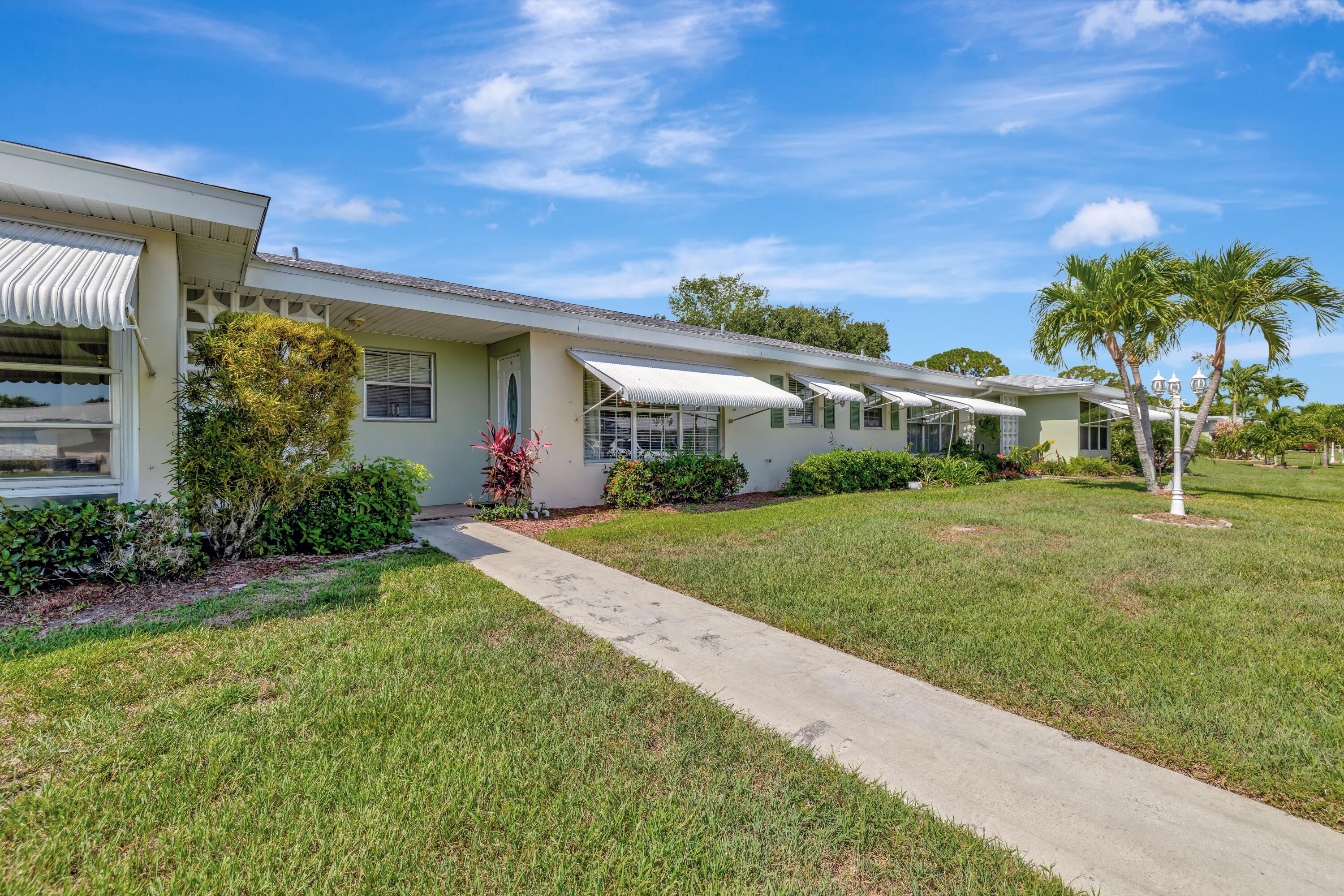 215 Manatee Lane, Unit B Fort Pierce, FL 34982 - Photo 2 of 22 jpeg-optimizer_2-print-3A5A1051