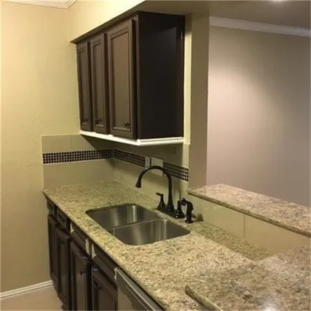 a view of swimming pool with a garden